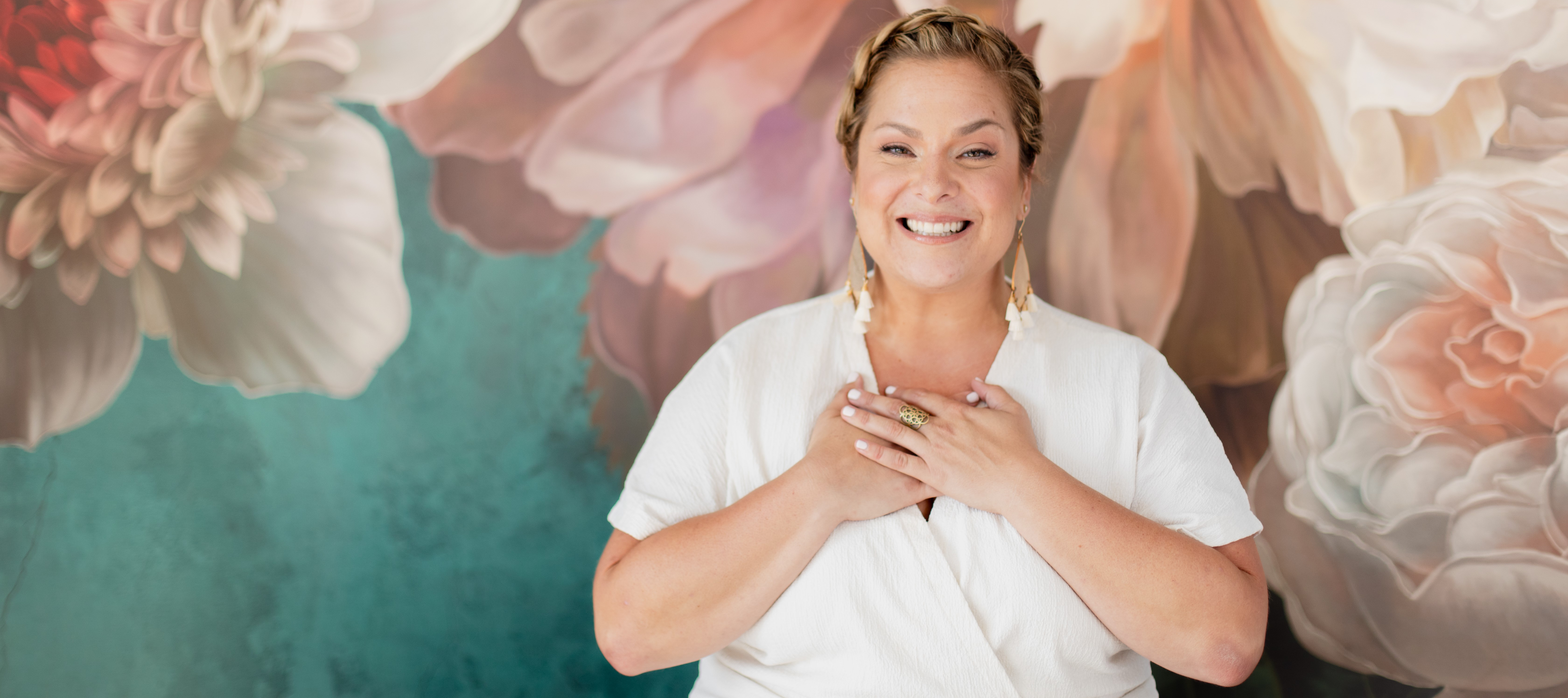 Shannon Kaiser with her hands over her heart