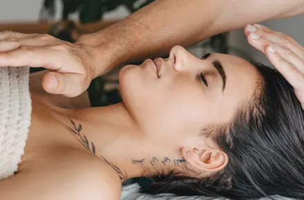 Woman receiving energy healing
