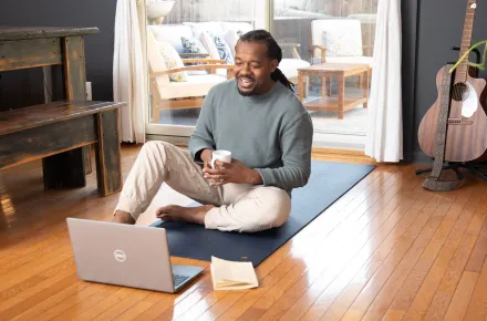 man looking at laptop