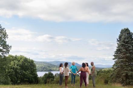 people standing outside in circle