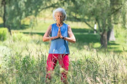 woman with hands at heart