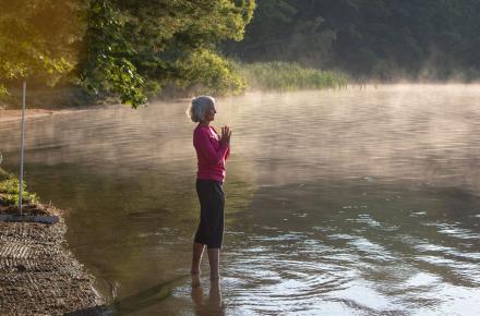 woman standing in lake