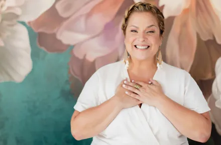 Shannon Kaiser with her hands over her heart