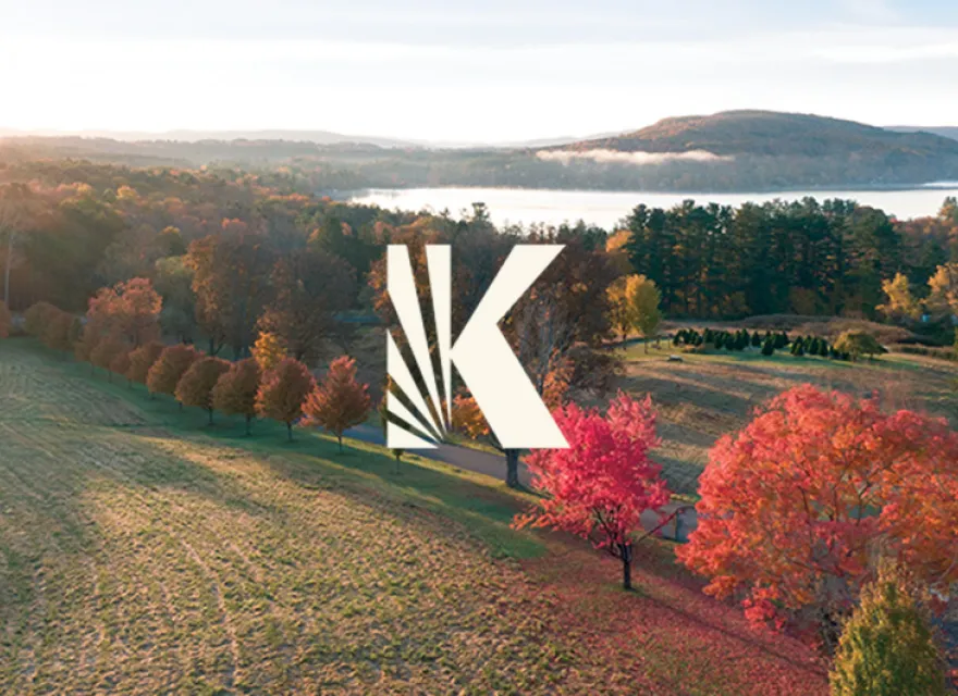 Kripalu's new word mark on a fall landscape of campus