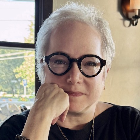 Elissa Altman woman with white hair and glasses