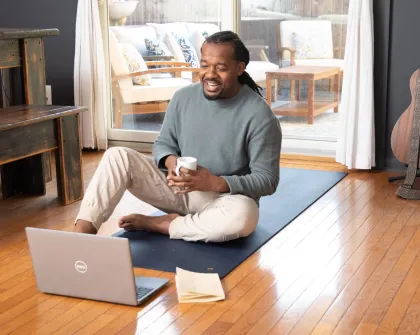 man looking at laptop