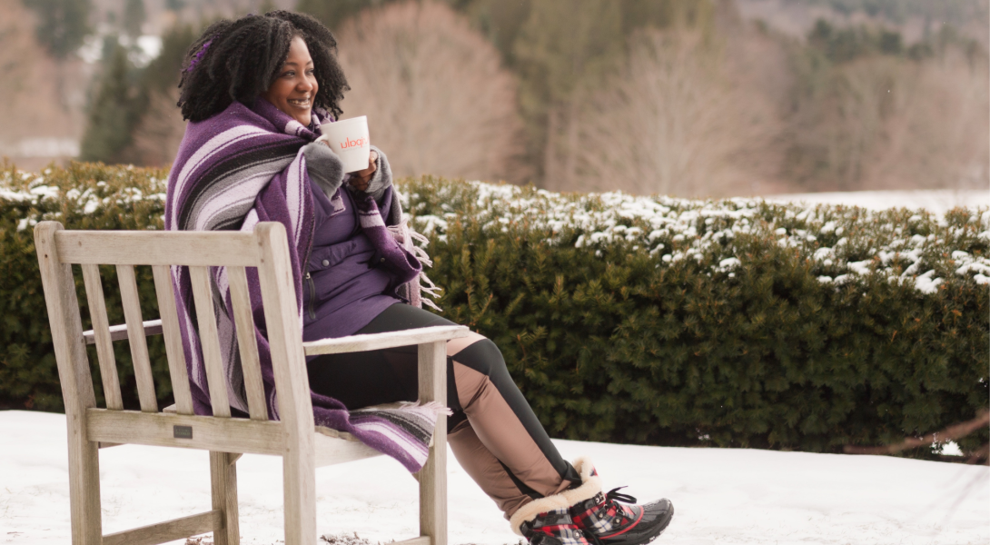 Outside drinking coffee