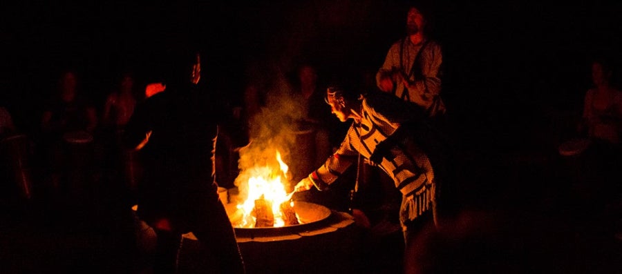_MG_8755_2women_around_fire2_0.jpg