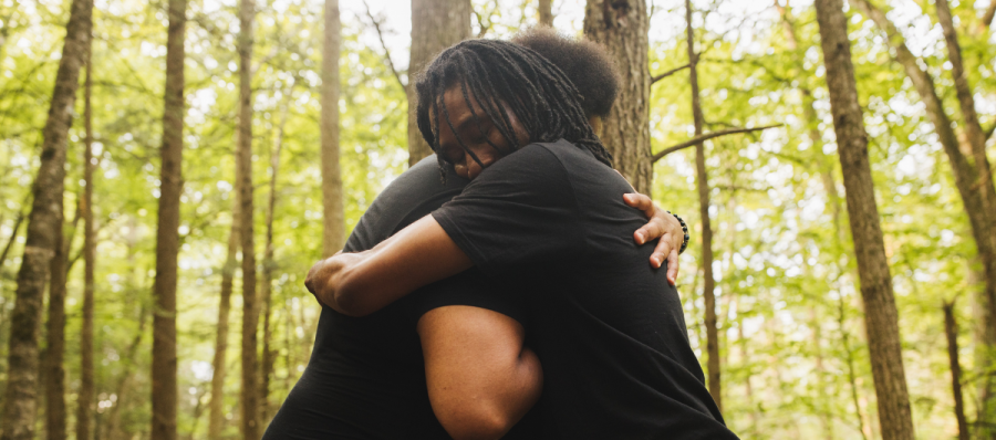 hugging in the forest
