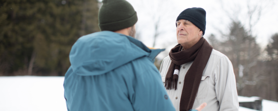 winter outside two men talking