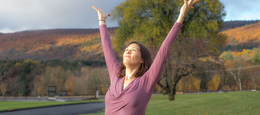 yoga in the fall with arms outstretched