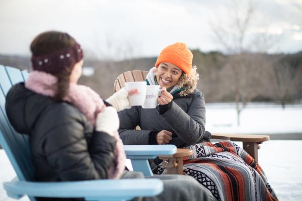 members outside drinking tea