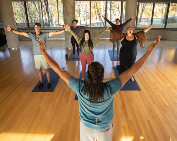 group yoga class inside