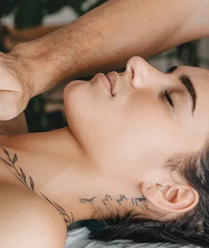 Woman receiving energy healing