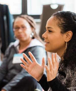 Group of people attending a yoga workshop