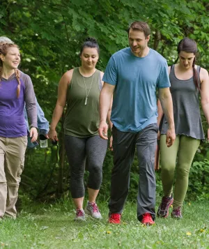 Group of people hiking outdoors in the spring
