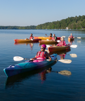 Guests Kayaking in the lake