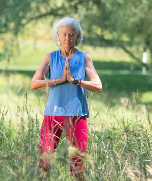 woman with hands at heart