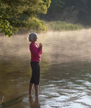 woman standing in lake