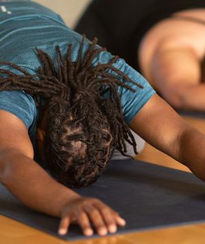 students in child's pose