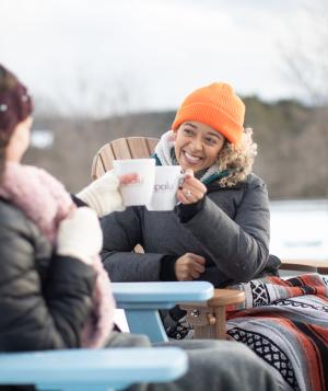 members outside drinking tea