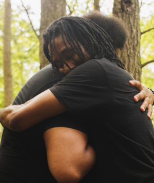 hugging in the forest