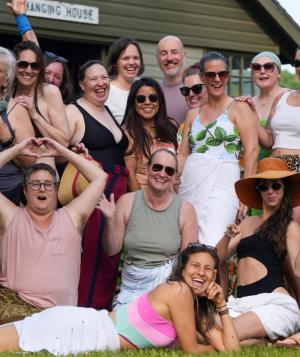 Group of people attending Love Camp, outside next to Lake Mahkeenac 